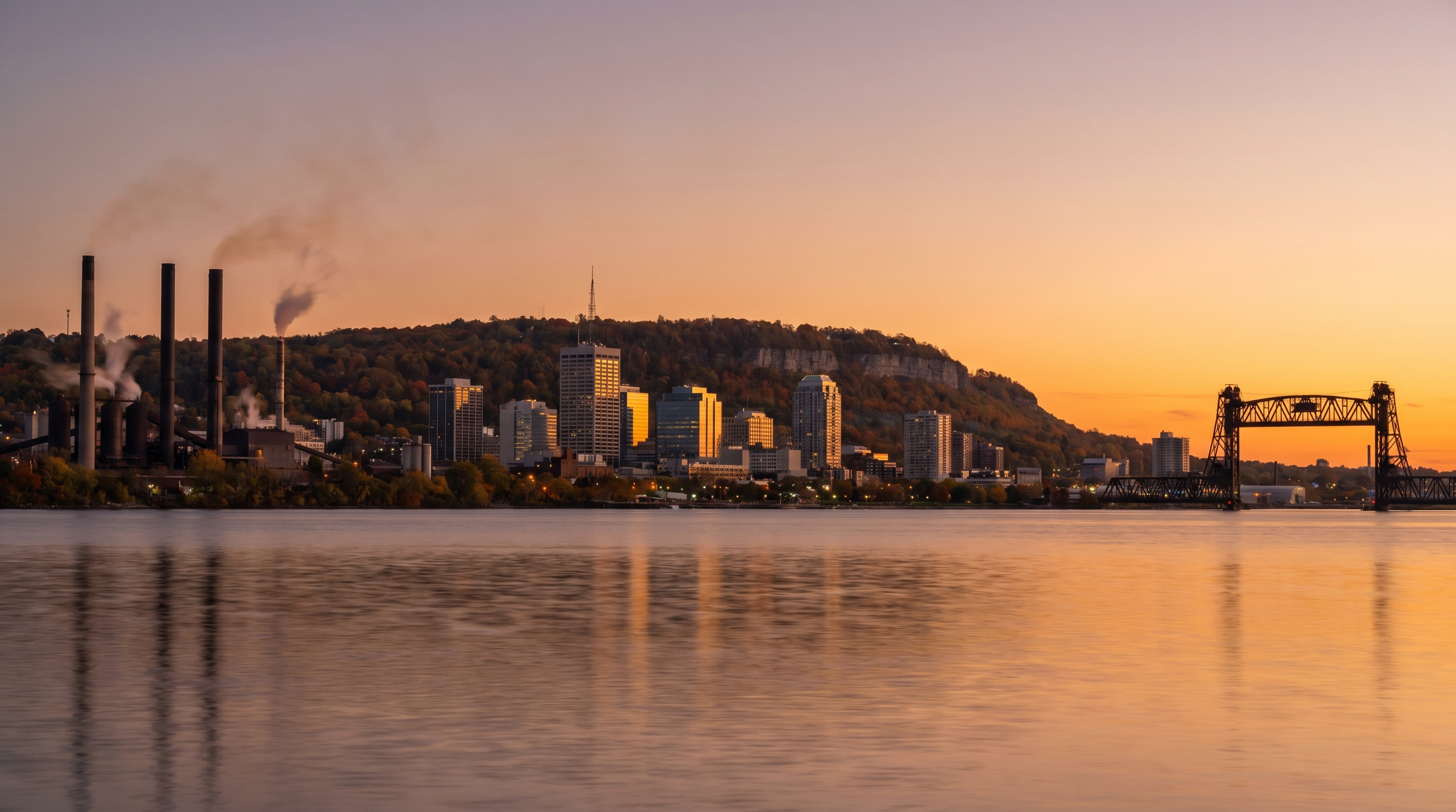 Hamilton Harbour at sunset with the Niagara Escarpment behind the downtown core