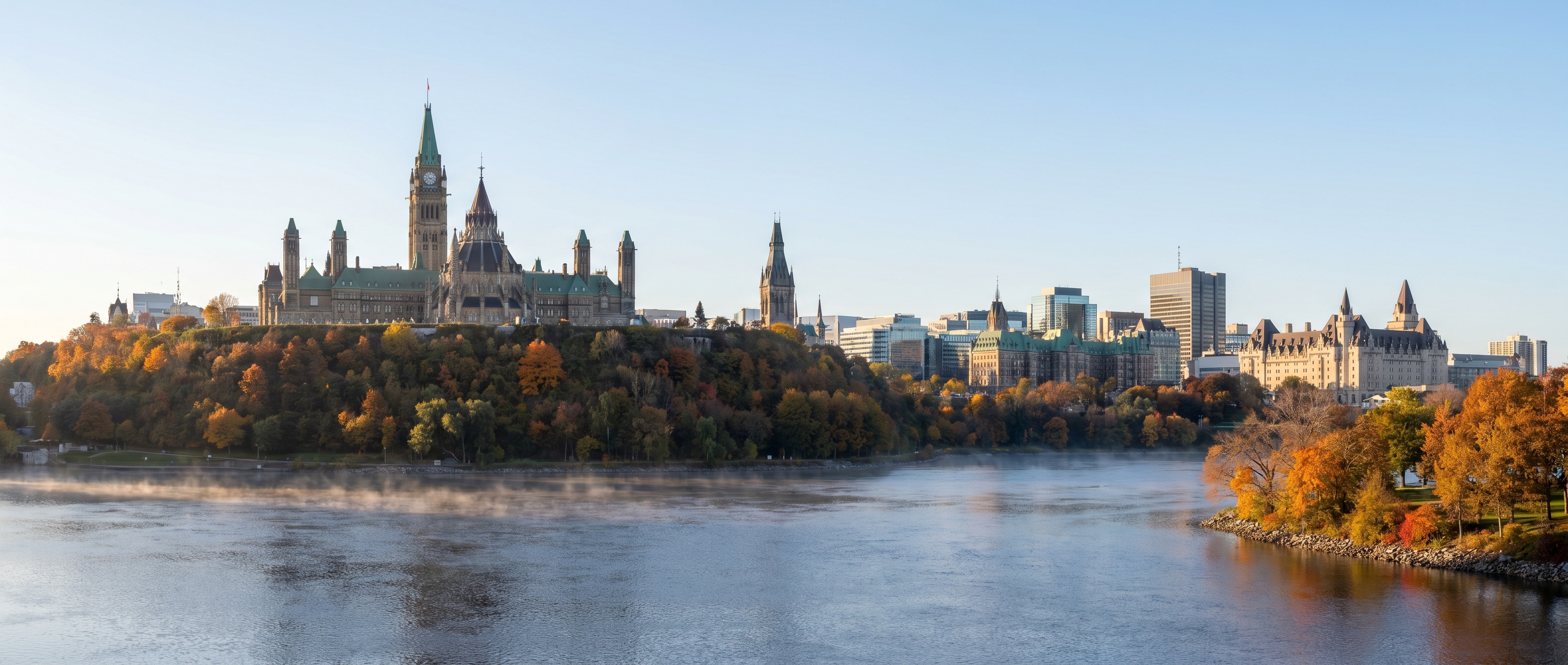 Ottawa Parliament Hill with the Peace Tower, Centre Block, Chateau Laurier, and autumn Ottawa River